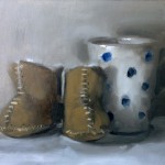 Still life oil painting of babies boots and a mug by Helen Davison